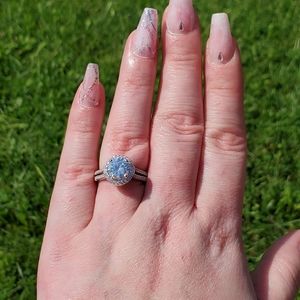 Platinum round halo engagement ring split shank